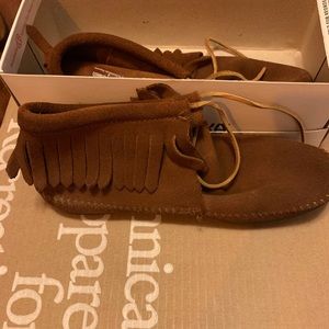 Minnetonka Moccasins-classic fringe hard-sole boot